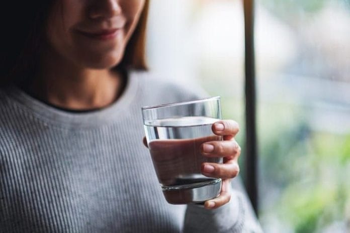 1761083068_closeup-image-beautiful-young-asian-woman-holding-glass-water-drink-person_1048944-184992751.jpg