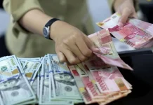 Rupiah Dibuka Lesu Pagi Ini: Melemah ke Rp16.571 per Dolar AS, Apa Pemicunya?